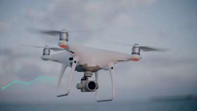 Text-free editorial photograph of a camera quadcopter in flight with a restrained BVLOS route overlay